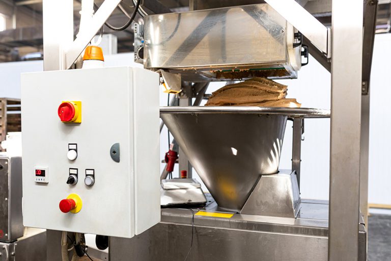 Bread production line, operation panel, product inspection monitoring display and bowl with kneaded dough in bakery